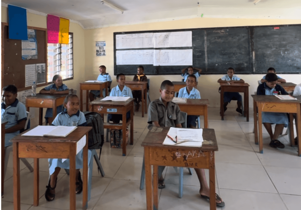 Students seated at their desks inside a classroom at Taviya District School in Fiji