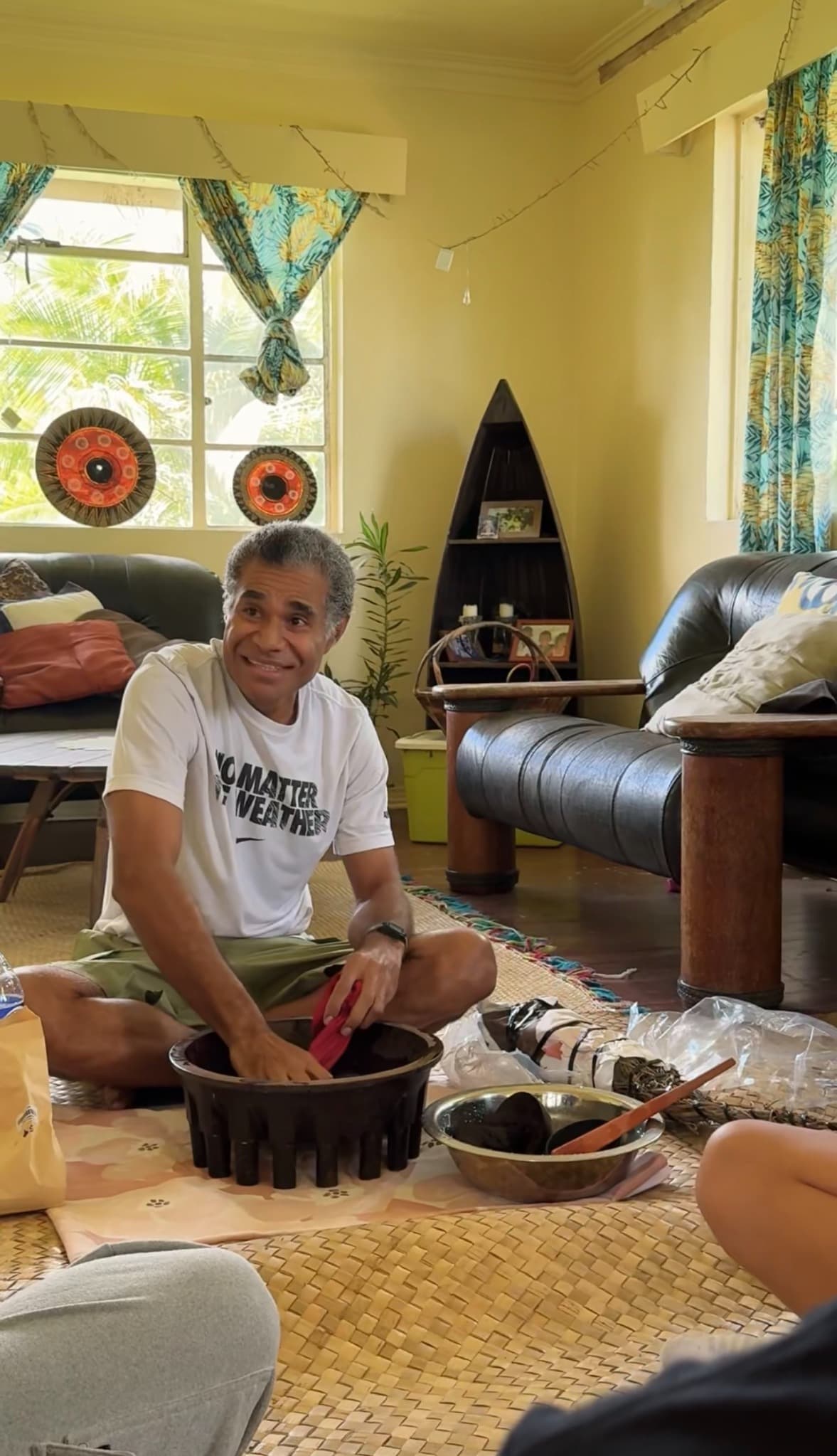 A man preparing kava during a sevusevu ceremony in Fiji