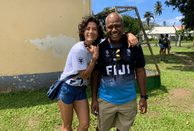 Gabrielle Frank standing with an OOCSA community leader in Fiji